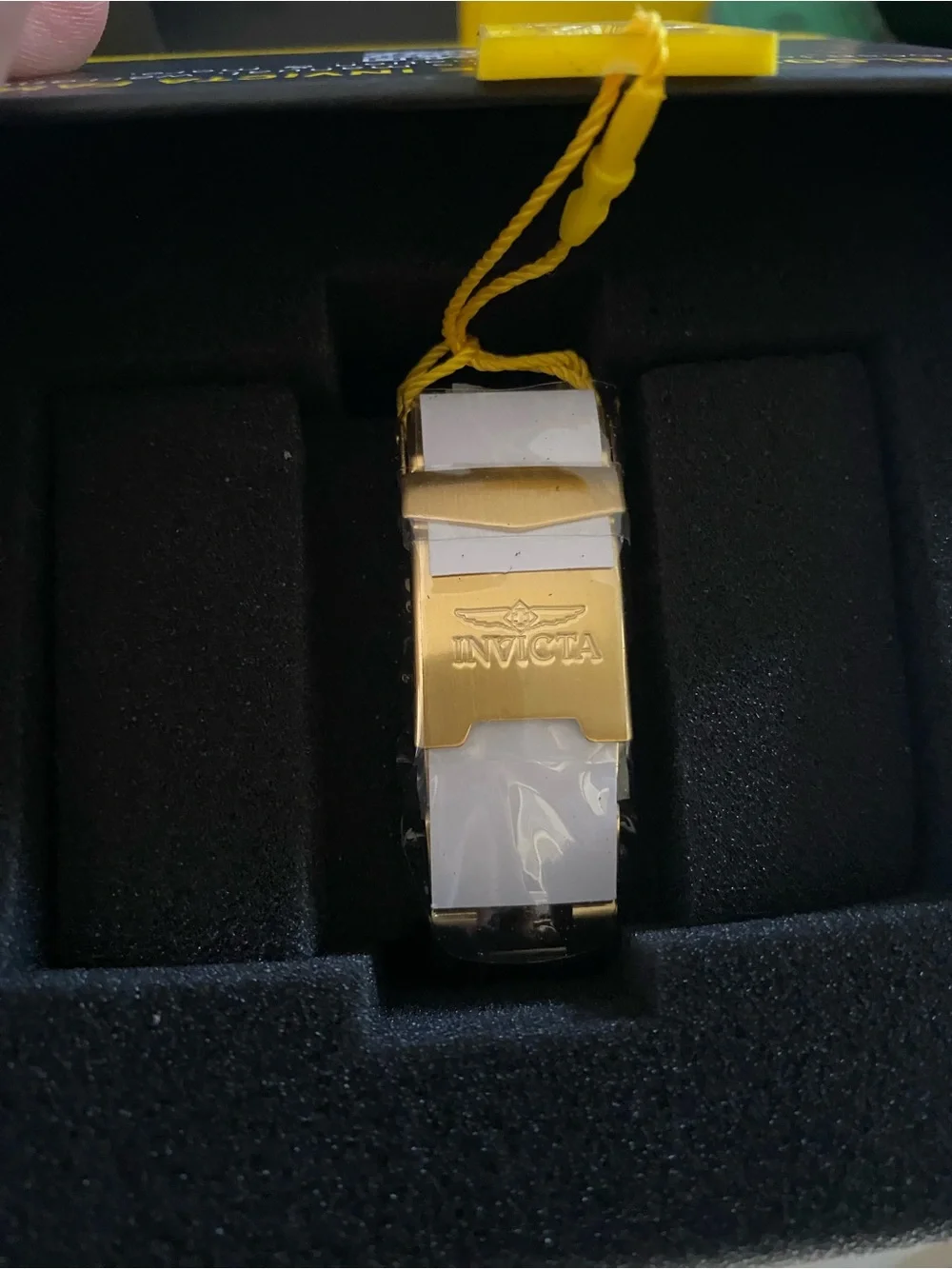 Invicta Gold Watch with Green Dial and Red Bezel